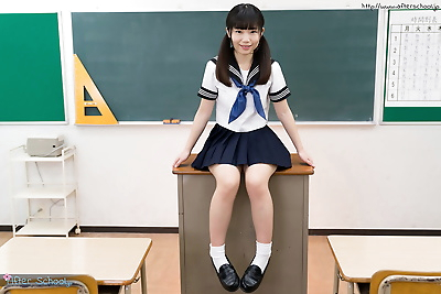 Tiny titted Japanese schoolgirl undressing to stand naked in the classroom